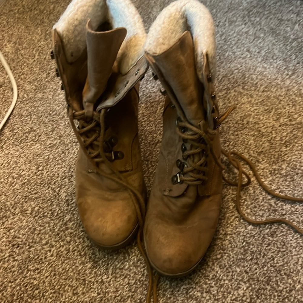 High heel lace up winter boots well worn